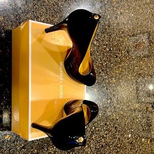 Black Michael Kors leather pumps. Size 9.